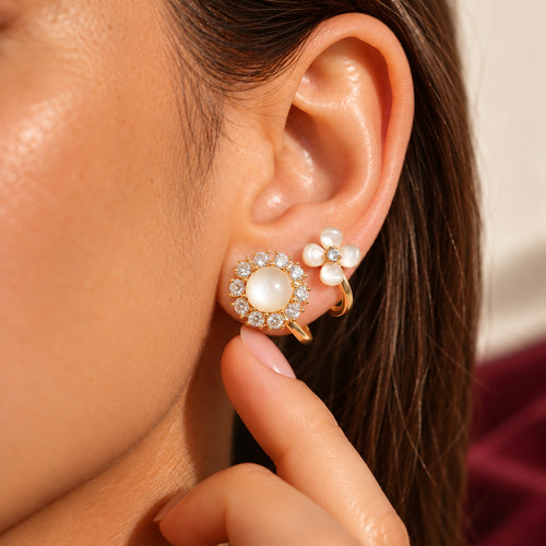 Detalle de los pendientes Margarita en la oreja